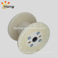 empty plastic thread spools